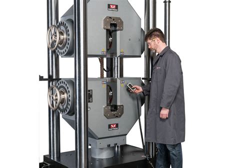 testing a steel bar with universal testing machine|tensile tester safety.